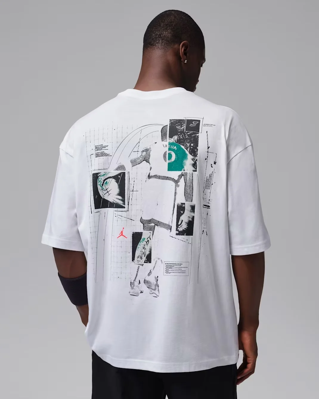 Back of the white Jordan Tatum Sport Dri-FIT Basketball T-Shirt featuring a large basketball-inspired graphic to match the Jordan Tatum 5 Sunrise.