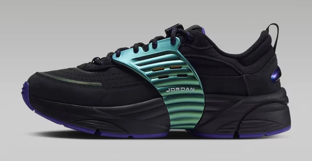 Jordan Trunner O/S SE Black Dark Concord sneaker featuring a black upper, iridescent green side cage, purple accents and chunky black sole, shown from the side.