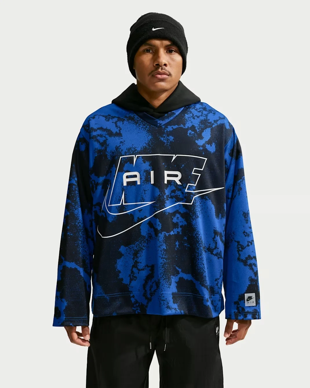 Royal blue and black Nike Air long-sleeve jersey with allover pattern and large white Nike Air logo