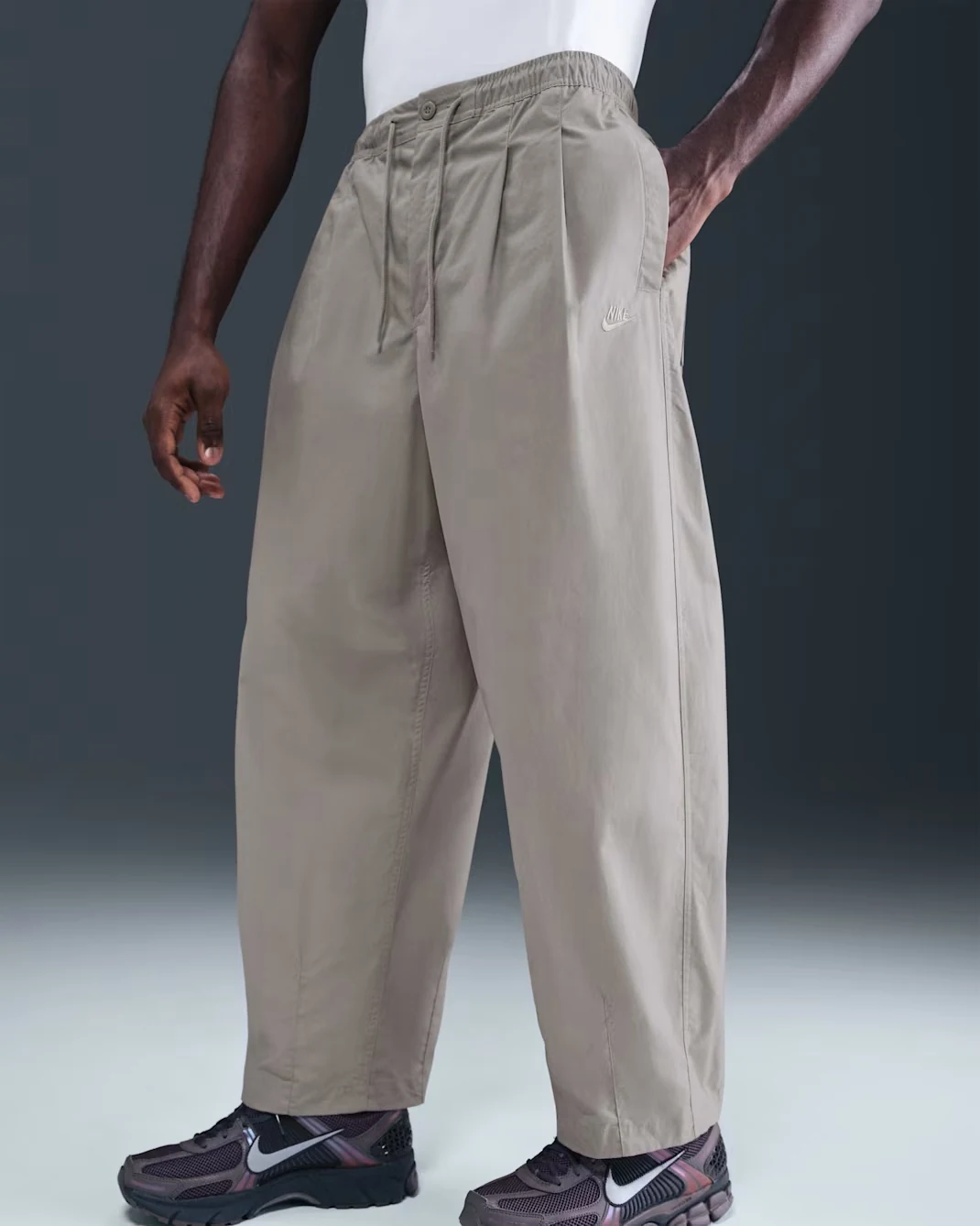 Nike Club men's balloon pants in College Grey with a relaxed wide-leg fit