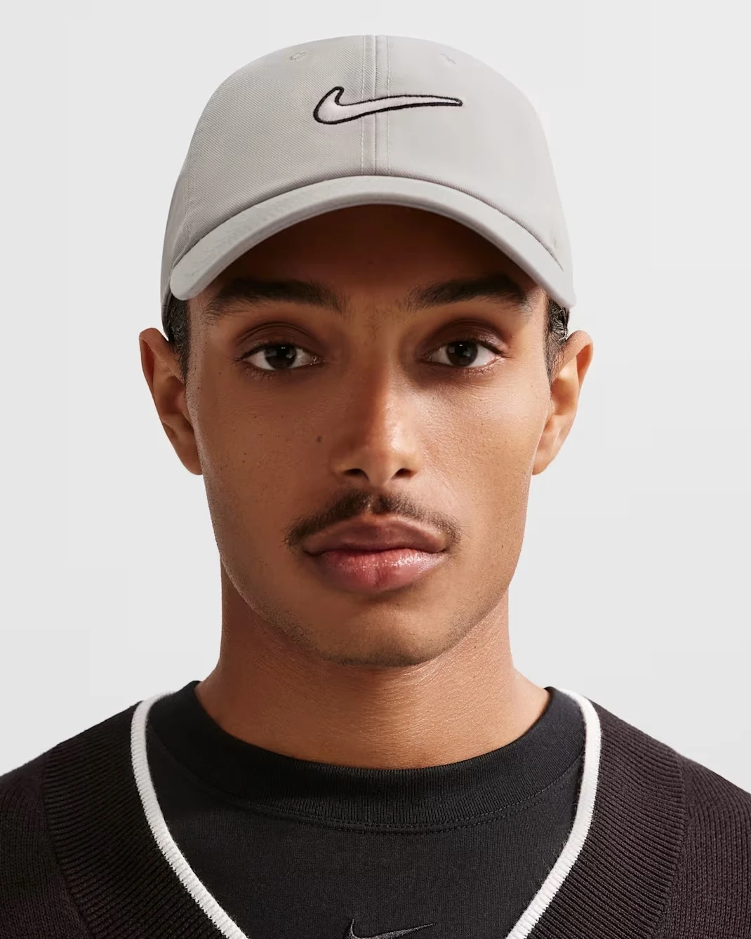 Nike Club unstructured Swoosh cap in College Grey with Black embroidered Nike Swoosh