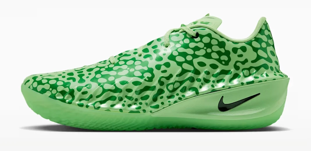 Nike G.T. Cut 4 Halloween basketball shoe in vapor green with darker green patterns and a black Swoosh, shown from the side.
