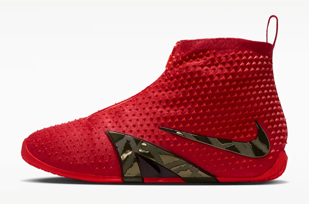 Side view of the Nike Ja 4 High Zombie Halloween basketball shoe in bright red with textured upper and dark metallic Swoosh.