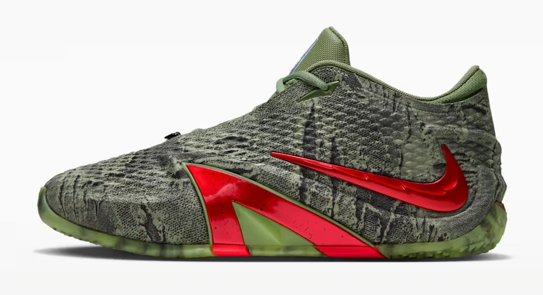 Nike Ja 4 Zombie Halloween basketball shoe in oil green with distressed black graphics, bright crimson accents and a red Swoosh.