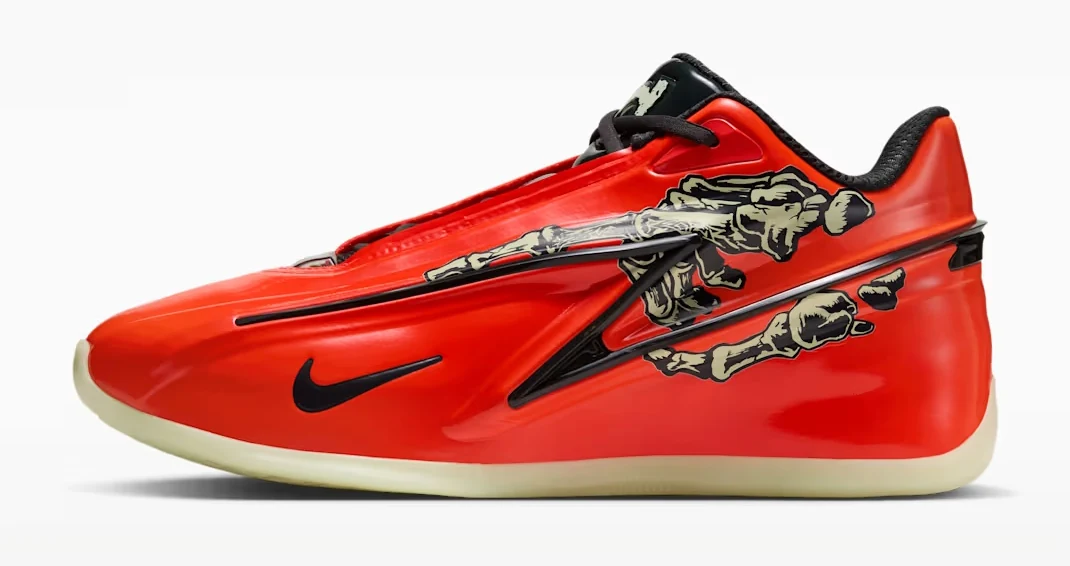 Nike KD19 Slim Reaper Halloween basketball shoe in bright crimson with black Swoosh and skeleton graphics along the side.