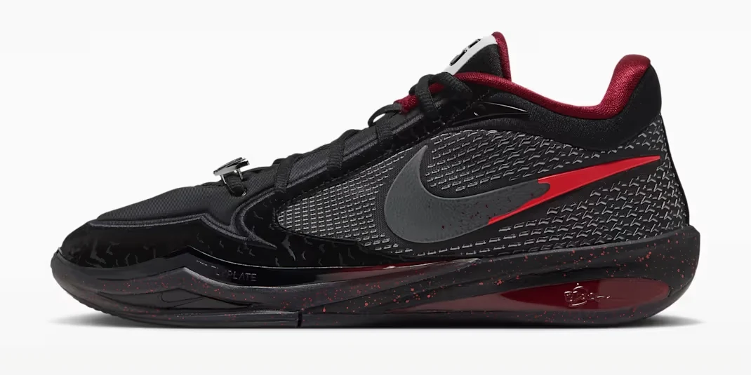 Side view of the Nike Sabrina 4 Count Ionescu Halloween basketball shoe in black and cool grey with red accents and dark Swoosh.