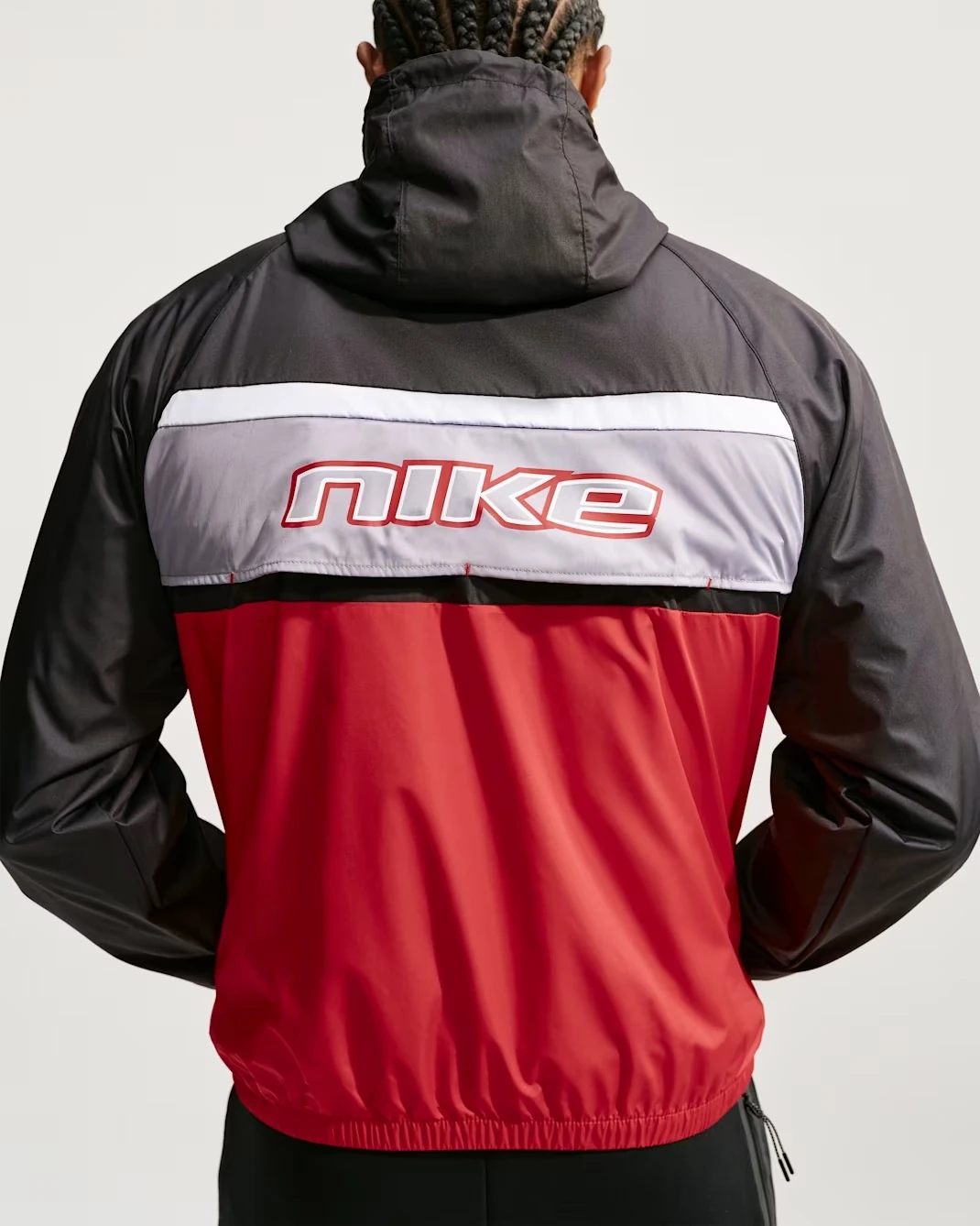 Back view of Nike Windrunner lined jacket in Black, Cement Grey and University Red