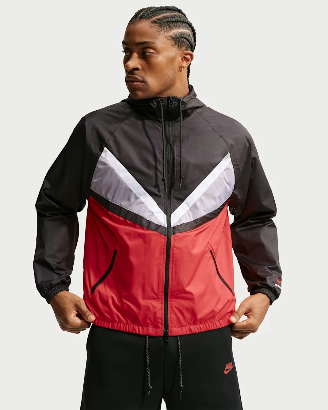 Jacket – Black, Cement Grey and University Red – Front View Front view of Nike Windrunner lined jacket in Black, Cement Grey and University Red