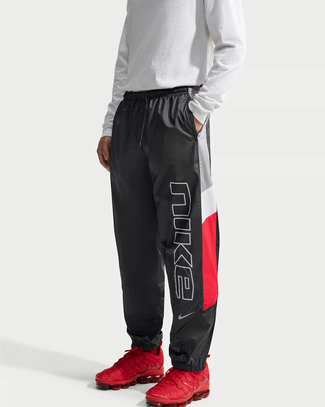 Nike Windrunner lined pants in Black, Cement Grey and University Red
