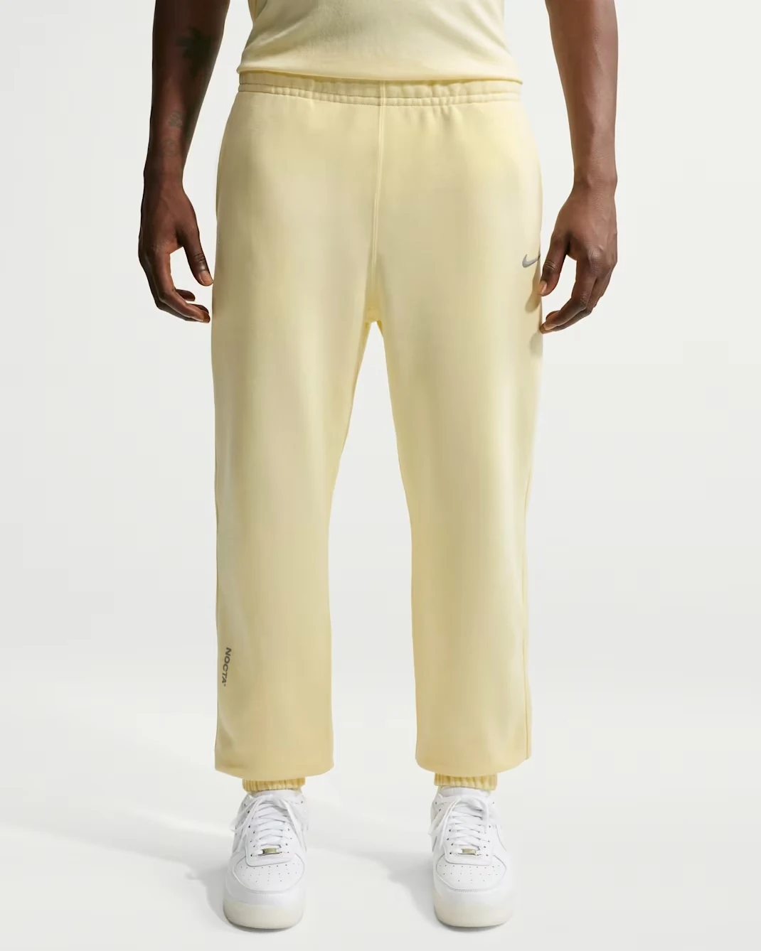 NOCTA Fleece CS sweatpants in Alabaster and Stealth