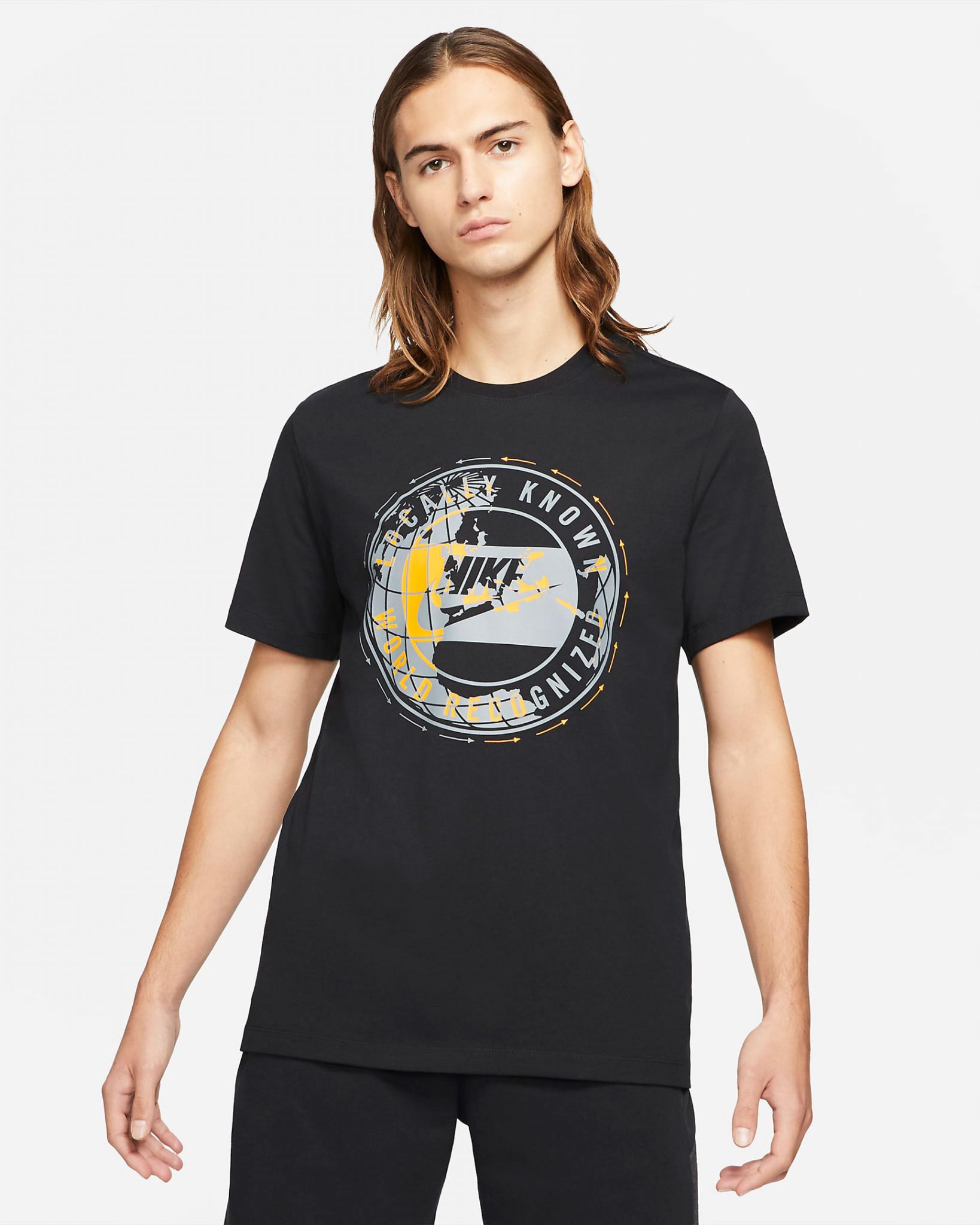 white & gold nike shirt